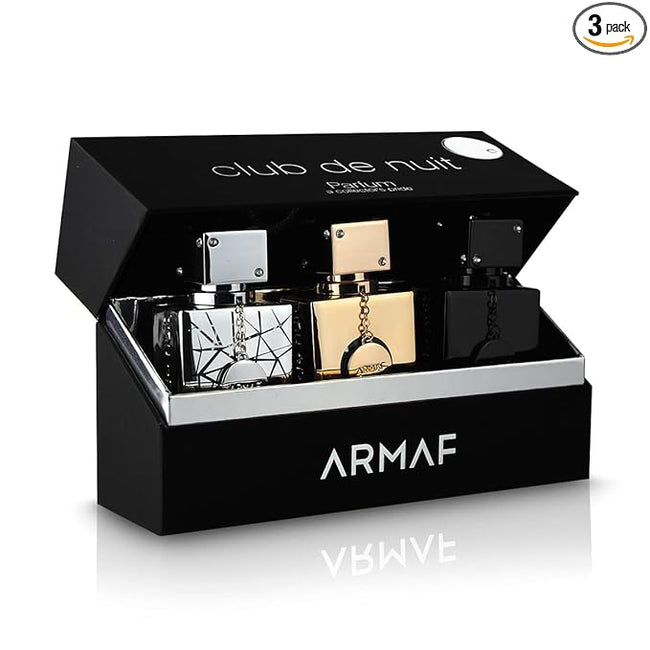 Armaf Club De Nuit 3-piece fragrance gift set for men including Intense Man EDT, Sillage EDP, and Milestone EDP 1.0 oz bottles in gift packaging.